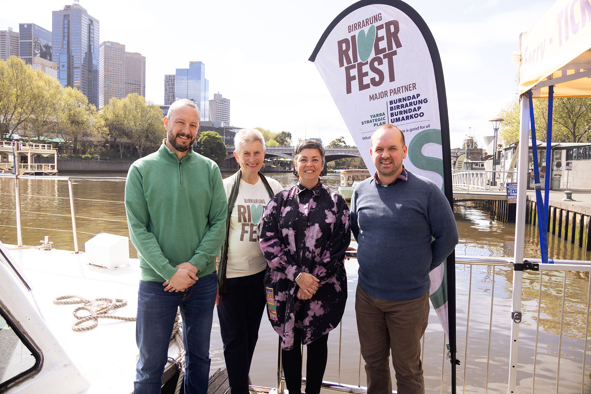 Chris Brace, Janet Bolitho, Zena Cumpston, Greg Bain stand along the Birrarung (Yarra)