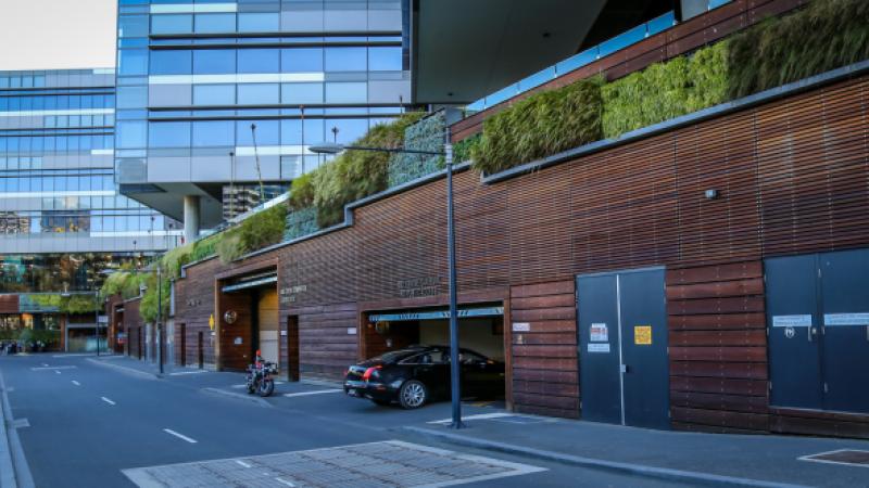 city building with green walls provide shade and insulation