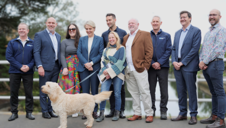 group photo with federal, state, and local representatives at Elster creek