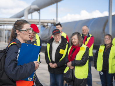 Melbourne Water guide talking to a tour group