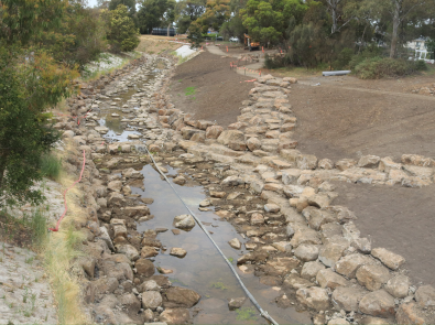 Rockwork in the Moonee Ponds Creek channel in low flows